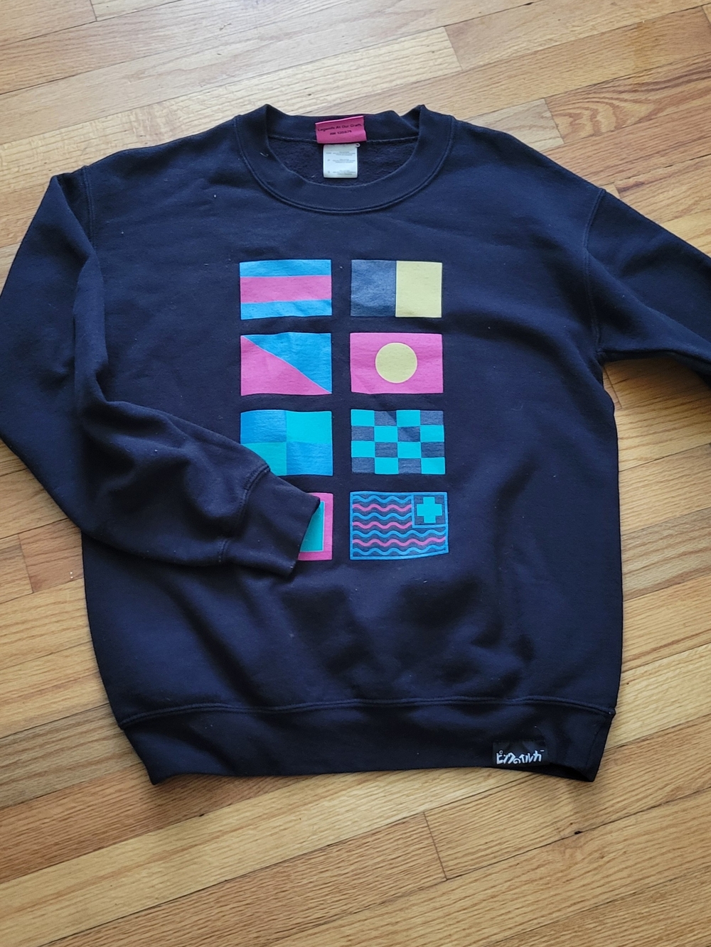 Pink Dolphin Black Crewneck Sweatshirt with Teal, Pink and Yellow Graphic Blocks